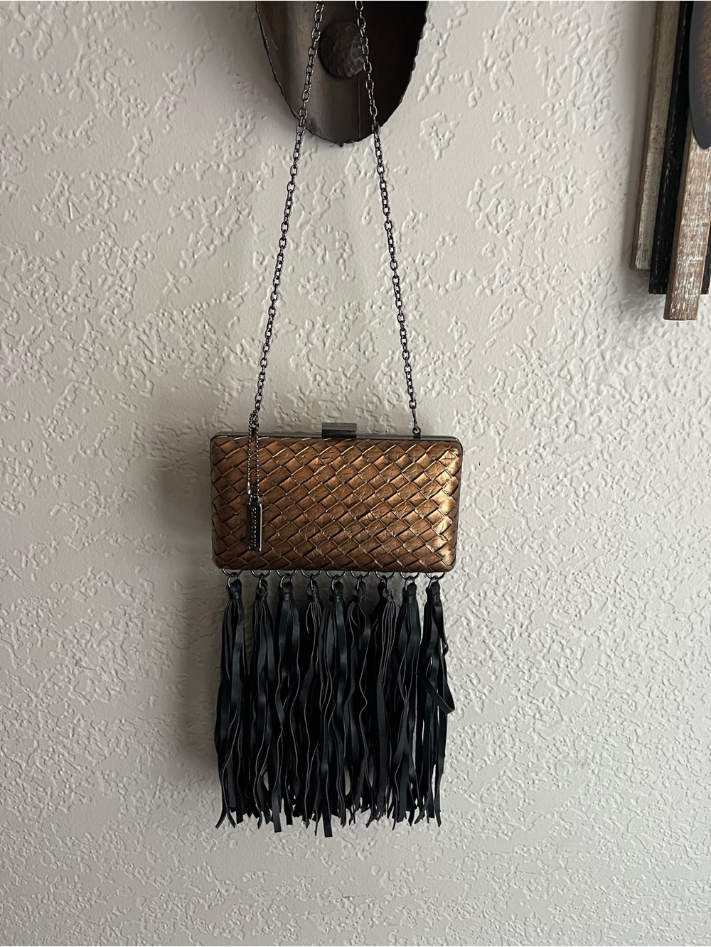 Glamorous Bronze Woven Clutch with Black Fringe